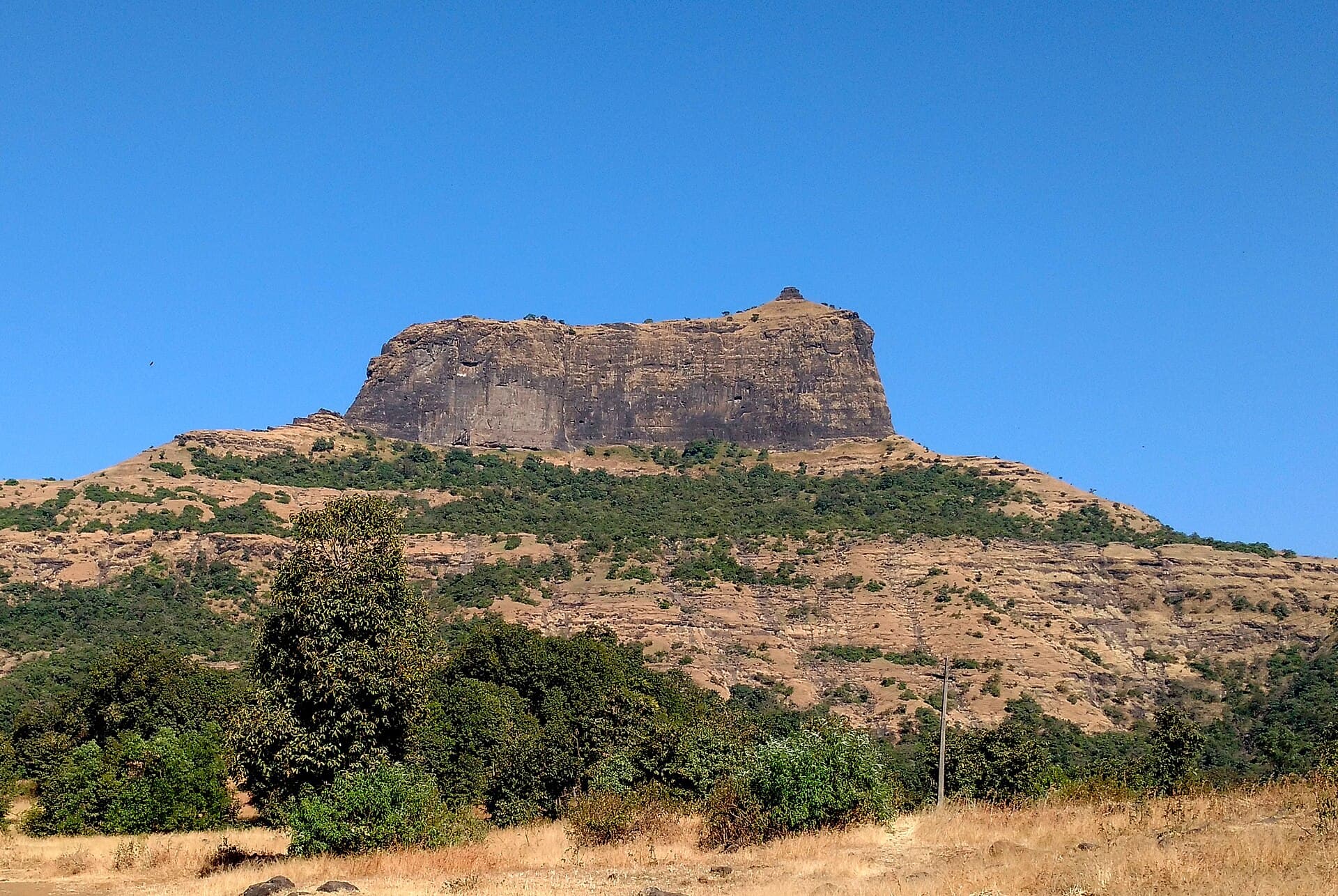 Rock-cut steps and steep slopes of Harihar Fort in Maharashtra